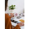 woman creating inspiring vision board side view (1) (1)
