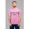 t shirt mockup of a redhead man with tattoos standing in a studio 22340