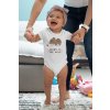 onesie mockup featuring a happy baby girl learning to walk m926 (1)