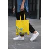 cropped face mockup of a man holding a tote bag in the street 29424 (1)