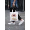 cropped face mockup of a man holding a tote bag in the street 29424 (6)