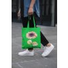 cropped face mockup of a man holding a tote bag in the street 29424 (7)