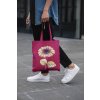 cropped face mockup of a man holding a tote bag in the street 29424 (1)