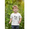 mockup of a toddler wearing a t shirt and walking in nature 2915 el1