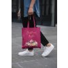 cropped face mockup of a man holding a tote bag in the street 29424 (1)