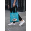 cropped face mockup of a man holding a tote bag in the street 29424 (3)