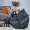 Veľký sedací vak s podnožkou na nohy, vhodný pre exteriér a interiér, antracitová farba, odolný voči vode a nečistotám. Doprajte si oddych na jednom z našich vakov.