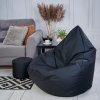 Veľký sedací vak s podnožkou na nohy, vhodný pre exteriér a interiér, čierna farba, odolný voči vode a nečistotám. Doprajte si oddych na jednom z našich vakov.
