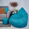 Veľký sedací vak s podnožkou na nohy, vhodný pre exteriér a interiér, tyrkysová farba, odolný voči vode a nečistotám. Doprajte si oddych na jednom z našich vakov.