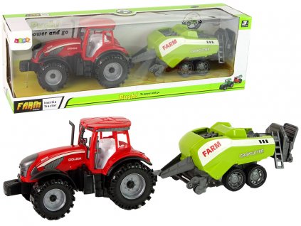 Červený zemědělský traktor s třecím pohonem zeleného secího stroje