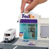 Matchbox Skutečná dobrodružství Expediční centrum Fedex + vozidlo HLY62