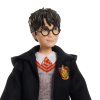 Panenka Harry Potter v kostýmu s hůlkou