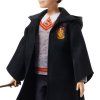 Panenka Harry Potter v kostýmu s hůlkou