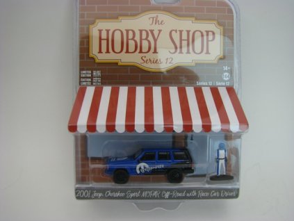 Jeep Cherokee Sport Mopar + Figurka 1:64 Hobby Shop série 12 Greenlight