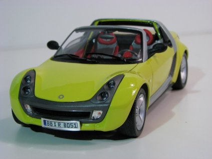 Smart Roadster žlutý 1:18 Bburago Italy 34099