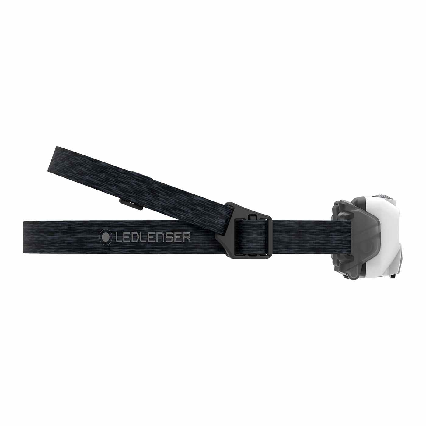 Ledlenser HF6R Core biela zboku — dvojitý popruh cez temeno a okolo hlavy s nápisom LEDLENSER, hlava v držiaku