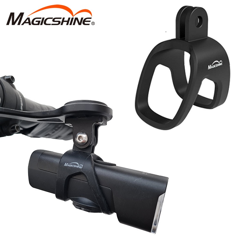 Magicshine MJ-6500 nasadený na svietidlo Magicshine zavesené v podvese predsadeného držiaka