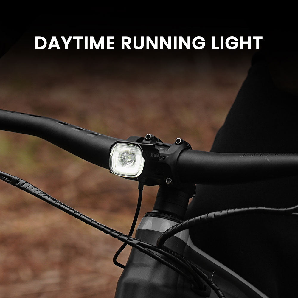 Denné svietenie svetla Magicshine ME 1000 V2.0 na riadidlách horského elektrobicykla