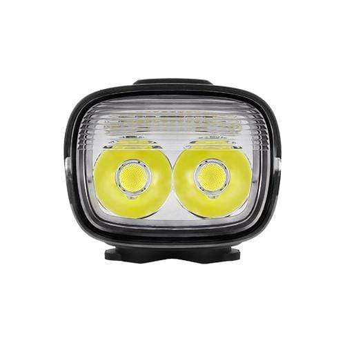 Čelný pohľad na rozsvietené Magicshine MJ-902S — dve LED a vodorovná mriežka denného svietenia