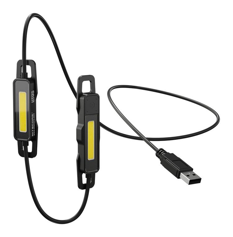 NITECORE UT05 – dva ploché svetelné diely so žltými COB panelmi spojené káblom so zástrčkou USB-A