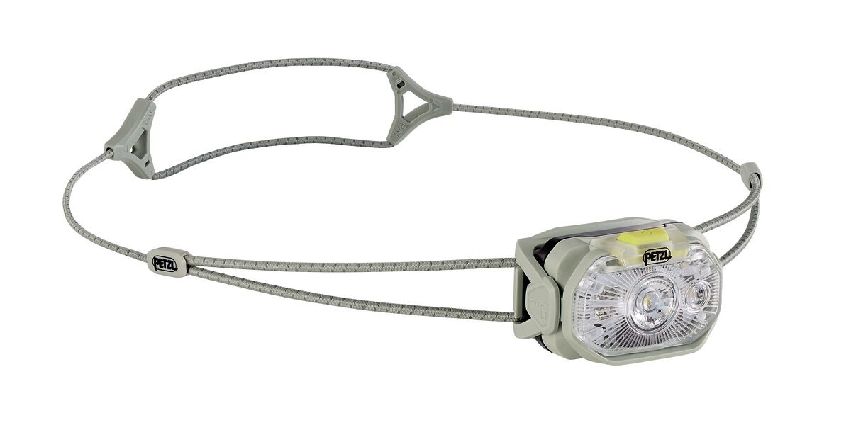 Petzl SWIFT LT v zelenej — pieskovozelené telo so žltozeleným tlačidlom a sivozelený hlavový pásik s reflexným vláknom