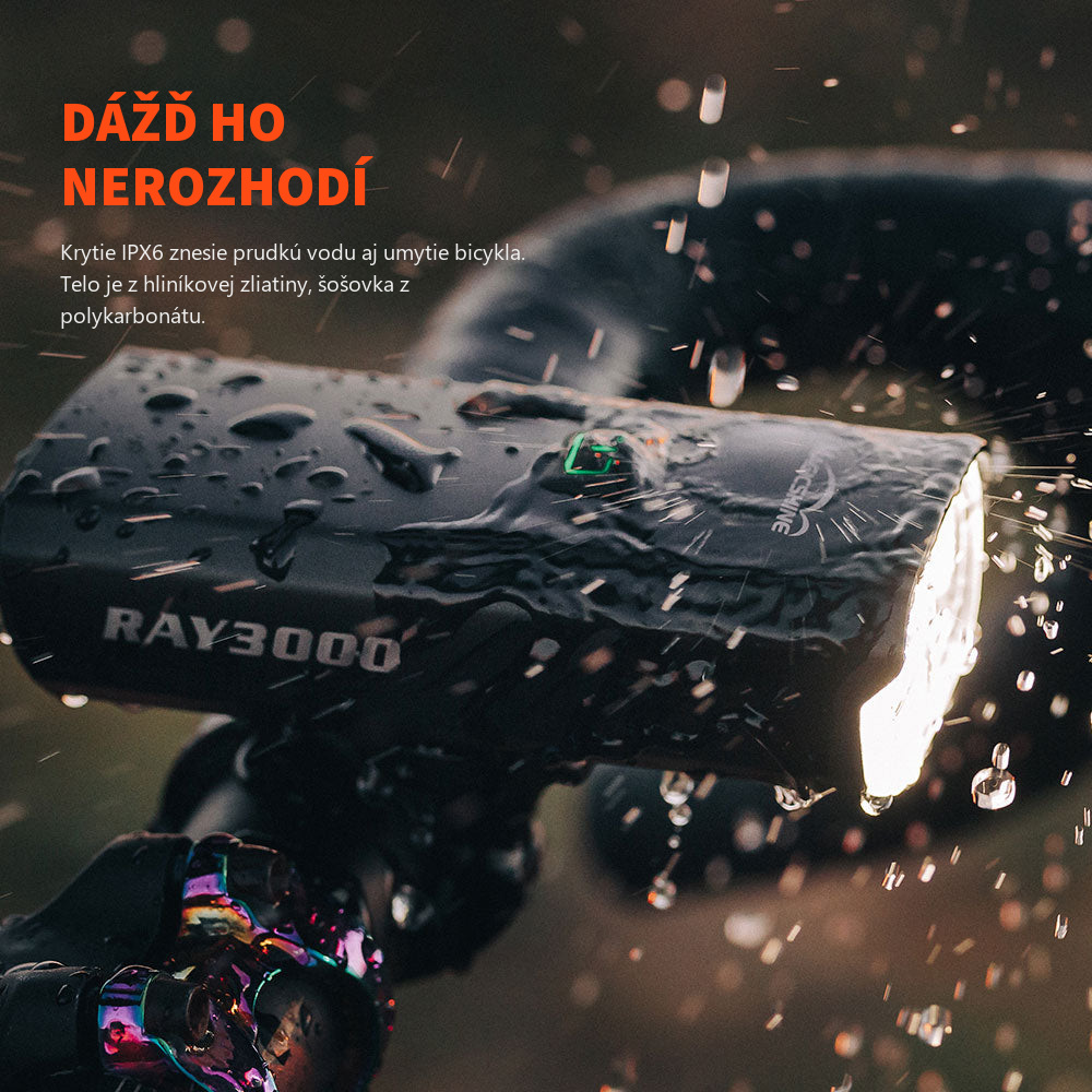 Magicshine RAY 3000 svieti v prudkom daždi na riadidlách bicykla — krytie IPX6 proti prúdiacej vode