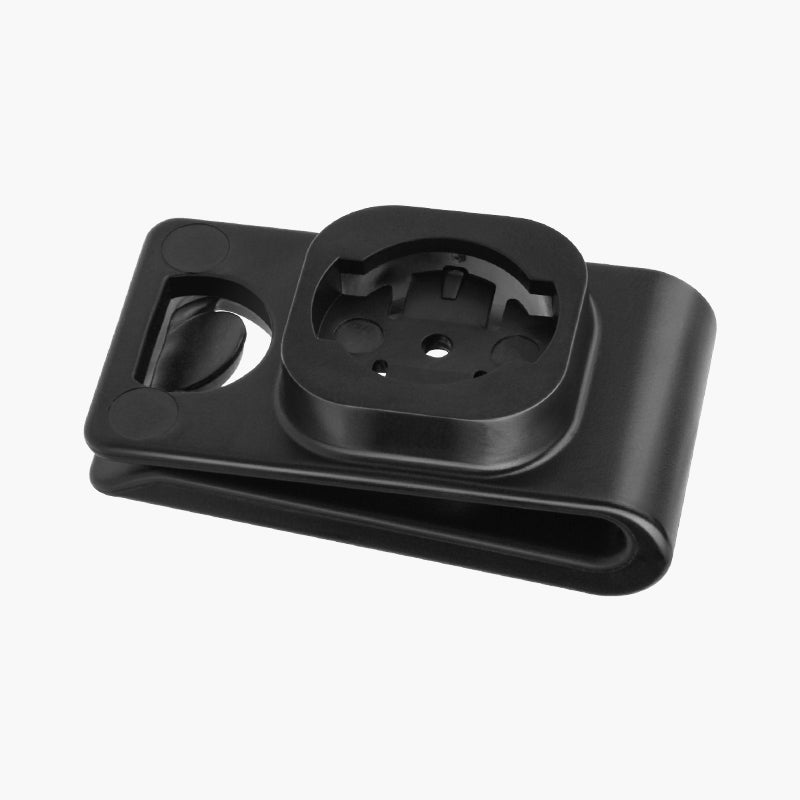 Detail klipu Magicshine SEEMEE zhora – krížové štvrťotáčkové lôžko Garmin so stredovým otvorom na prednej stene klipu
