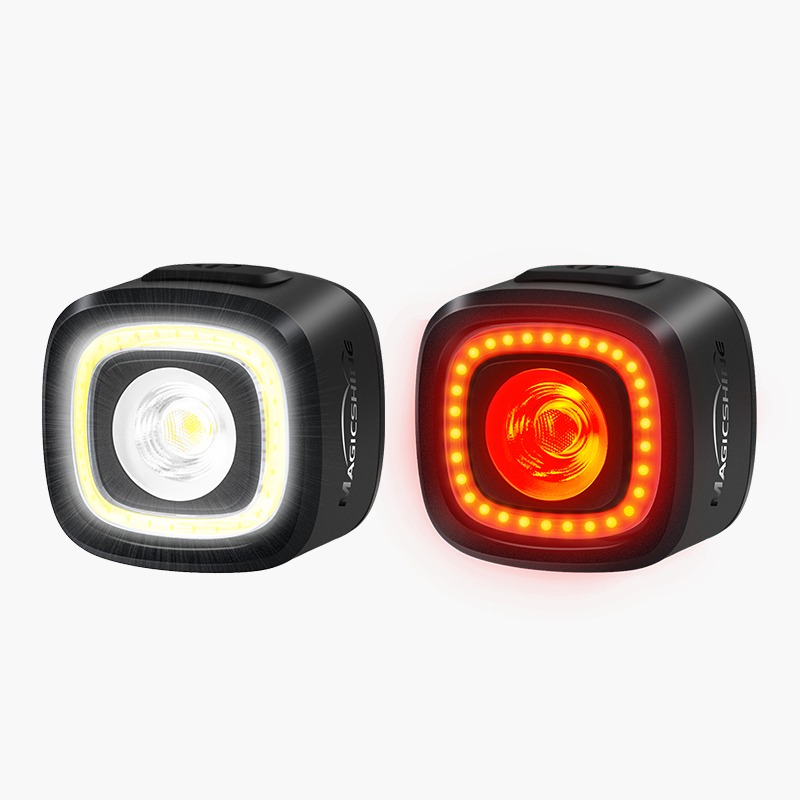 Magicshine SEEMEE 150 COMBO V2.0 predné svetlo svieti nabielo a zadné načerveno, obe telá rovnakého tvaru vedľa seba
