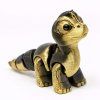 mini dinosaurus zlatočerný