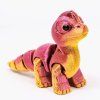 mini dinosaurus růžovozlatý