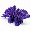 mini stegosaurus fialovomodrý