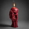 svíčka kostlivcova ruka červená