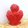 Svíčka - sedící anděl červený 11 cm