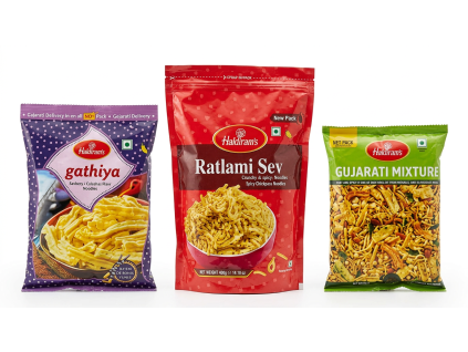 Keep exact same packet construction, sealing, and shape from original for all three packages, only change orientation to standing upright vertically, do not change packet style or construction