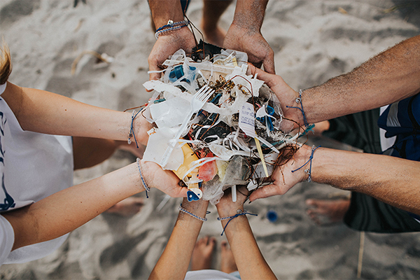 4ocean_hands-holding_trash