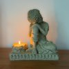 Soška Buddha - Chrám klidu  výška 17,5 cm, lotosový květ na čajovou svíčku