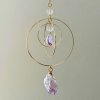 Lapač slunce - Galaktické kruhy  s ametystem, symbolem slunce, zlatý, 3 pohyblivé kruhy, délka 38,5 cm