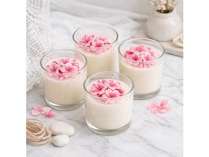 Elegant soy candles with pink hydrangeas