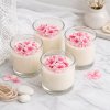 Elegant soy candles with pink hydrangeas