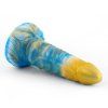 Modro-žluté dildo Elf položené na boku