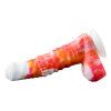 Bílo-oranžové dildo Pony položené na boku