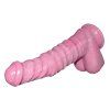 Růžové dildo Pony položené na boku