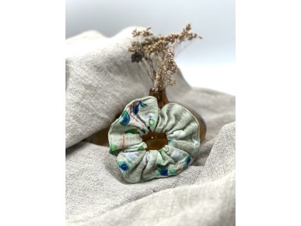 Mušelínová gumička - světle zelená s lístky