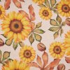 Režná látka v metráži s motivem slunečnic na béžovém podkladu.