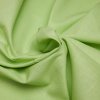 Elegantní bavlněná látka v svěží zelené barvě, ideální pro tvoření a bytové dekorace.