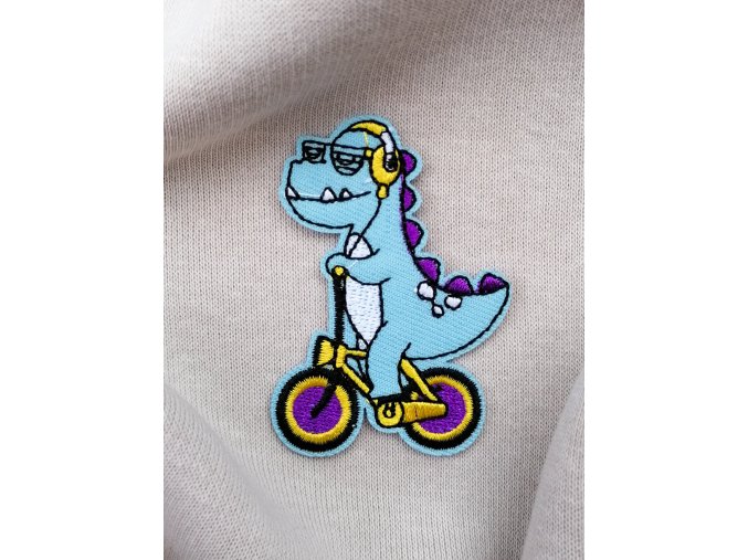 Dino na kole