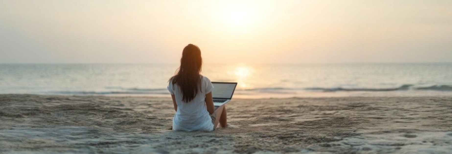 woman-working-laptop-sunset-beach_980225-29273-Photoroom