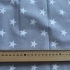 Šedé bavlněné plátno s bílými hvězdičkami