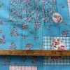 Bavlněné platno patchwork motiv růží na modré