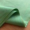 Těžší zelené pevné bavlněné plátno barva hrášková